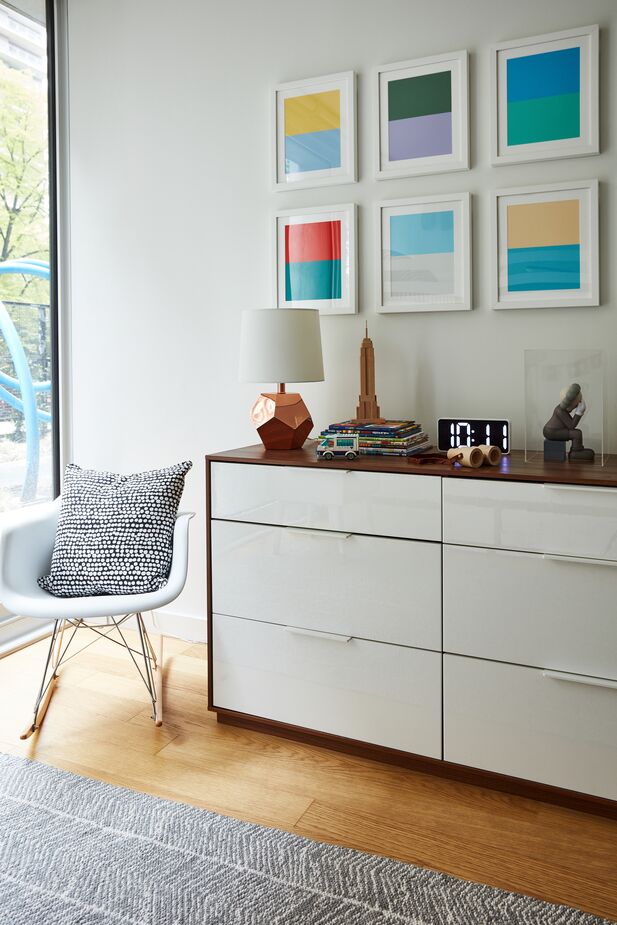 Wood and acrylic, metal and wool, neutral hues with pops of color: This room is MCM style in a nutshell. Room by One Kings Lane Interior Design. Photo by Frank Tribble.
